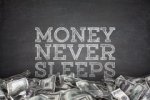 money-never-sleeps-blackboard-background-pile-dollar-bills-black-44803482.jpg